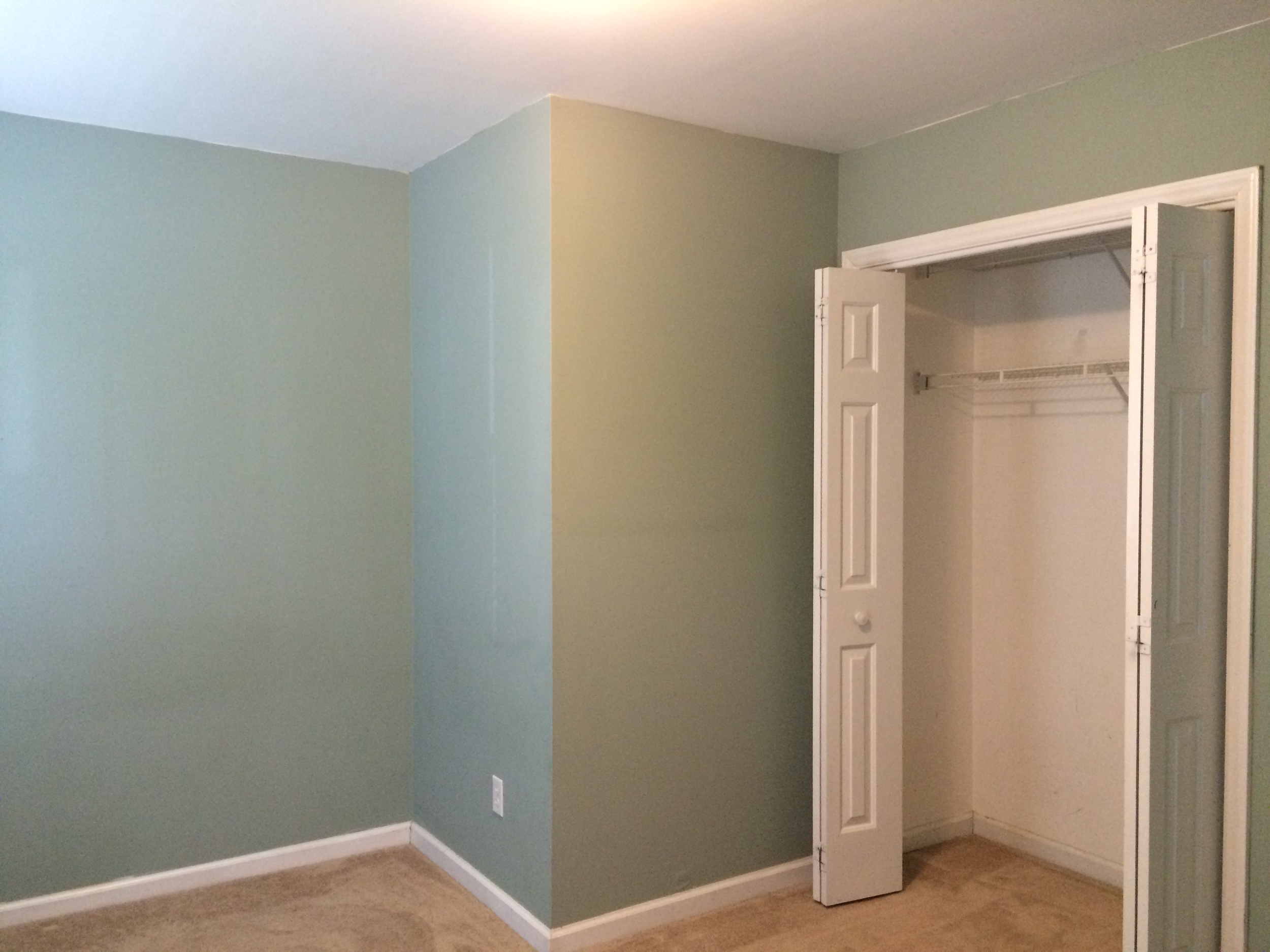 Bedroom — the only paint color in the whole house that we liked.