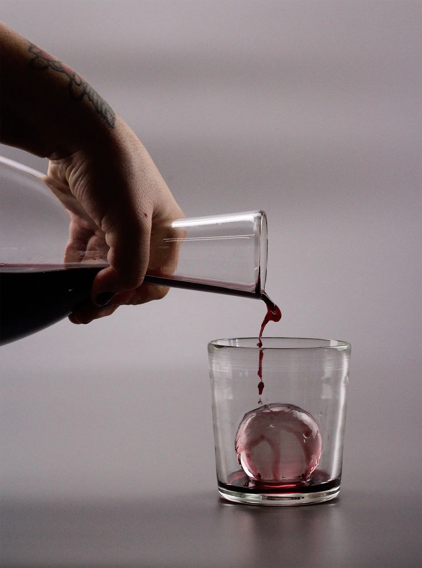 decanter sphere pour straight on.jpg
