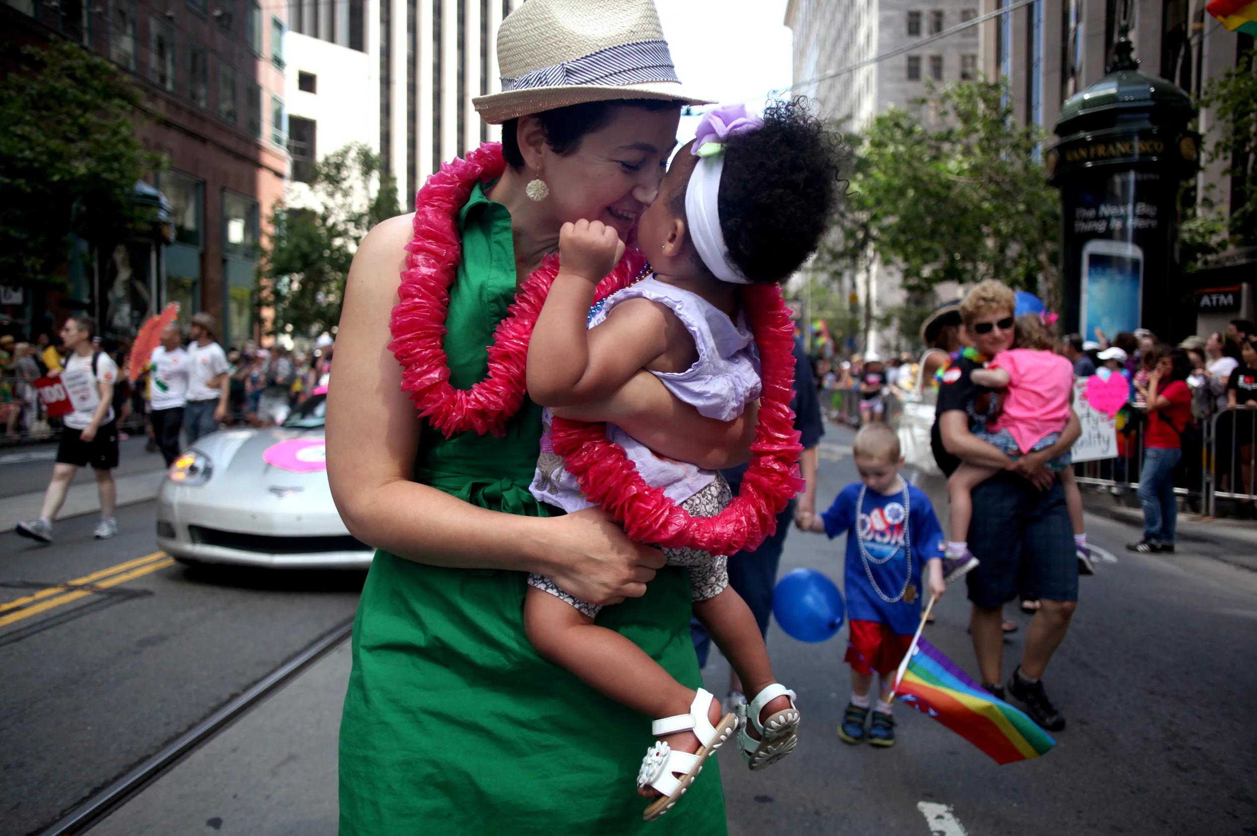 Elana with her happy baby Nia along the parade route. 