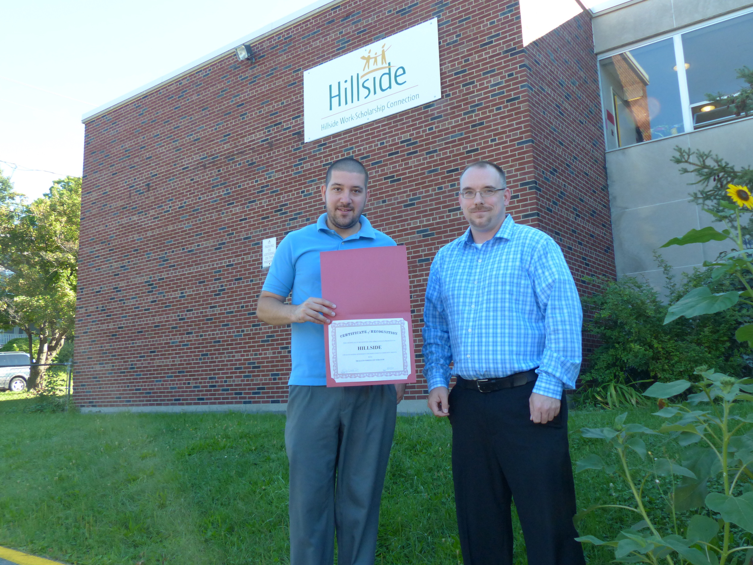 (Pictured L-R) Mike Olsen from Hillside and Michael Watrous from Meals on Wheels of Syracuse