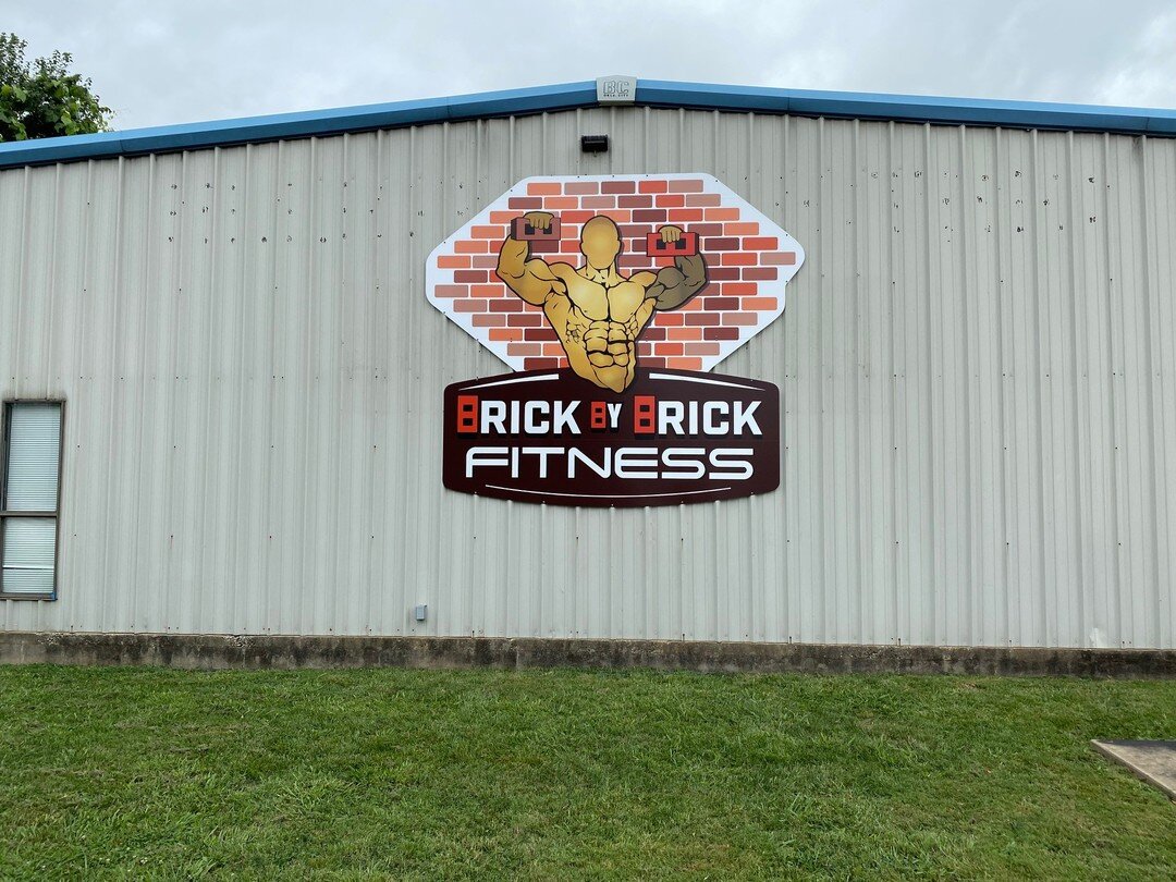 Brick By Brick Fitness has an awesome new sign on their building. If you are looking to get fit, check them out.