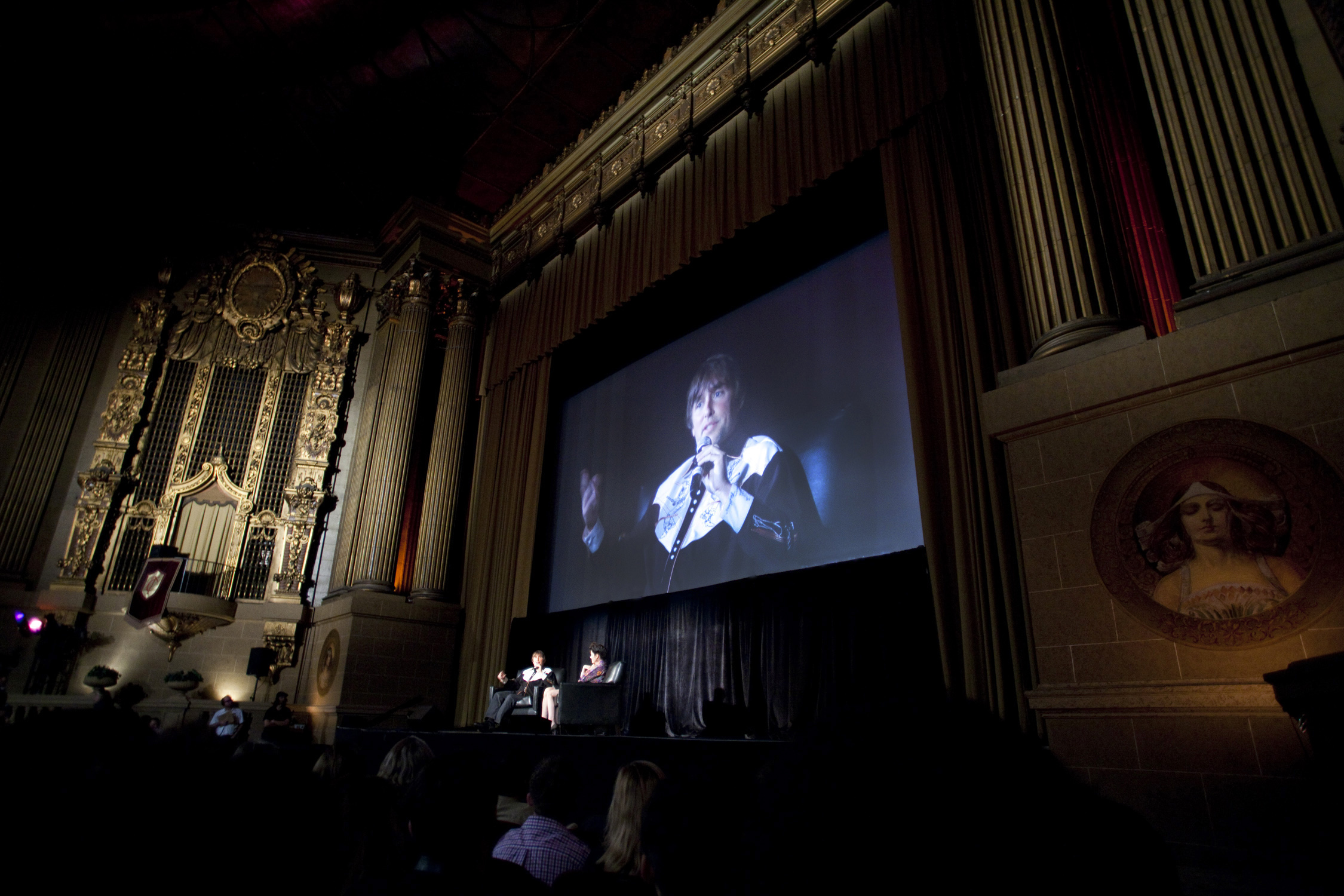 Founder's Directing Award recipient Richard Linklater and Parker Posey on stage with a screening of BOYHOOD
