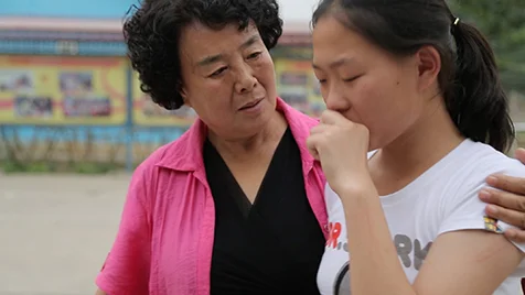Ms. Zhang with young girl