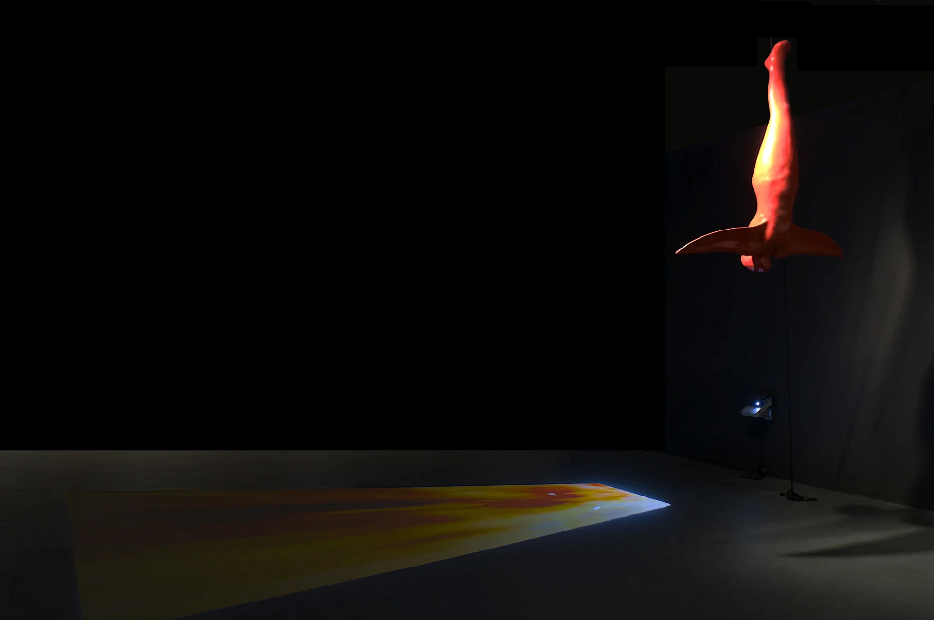 Inanna (plaster sculpture) and Learning to Fly (video loop)