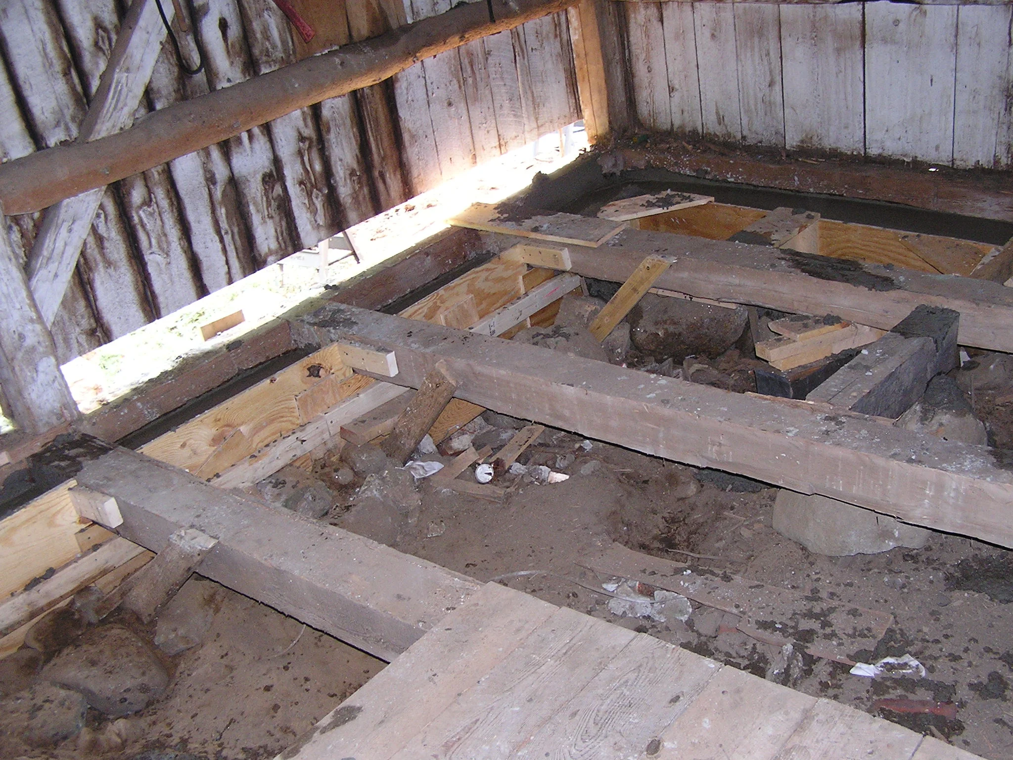 Here rotted joists have been replaced with vintage timbers that are sound.