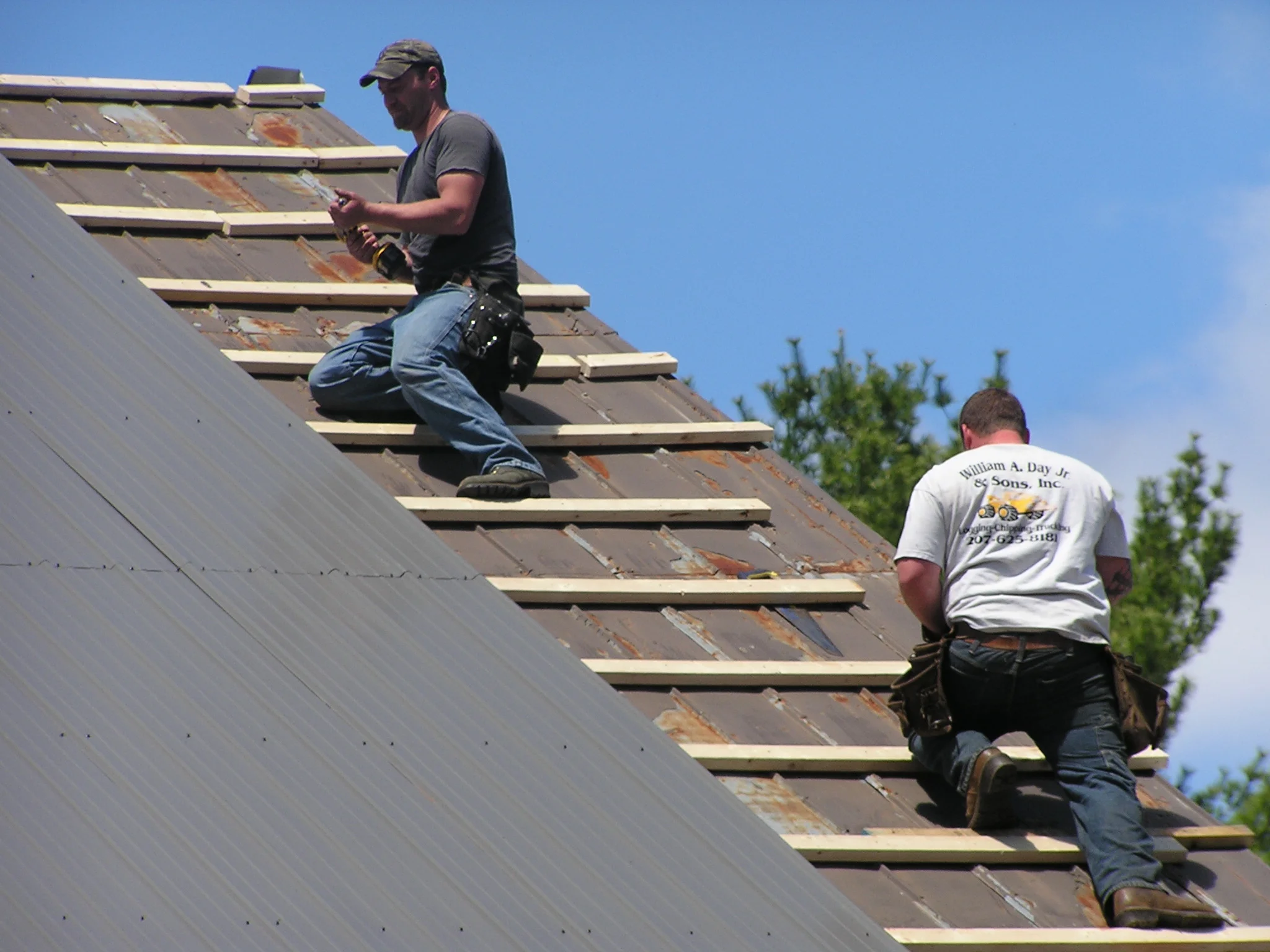 An old barn gets a new steel roof.