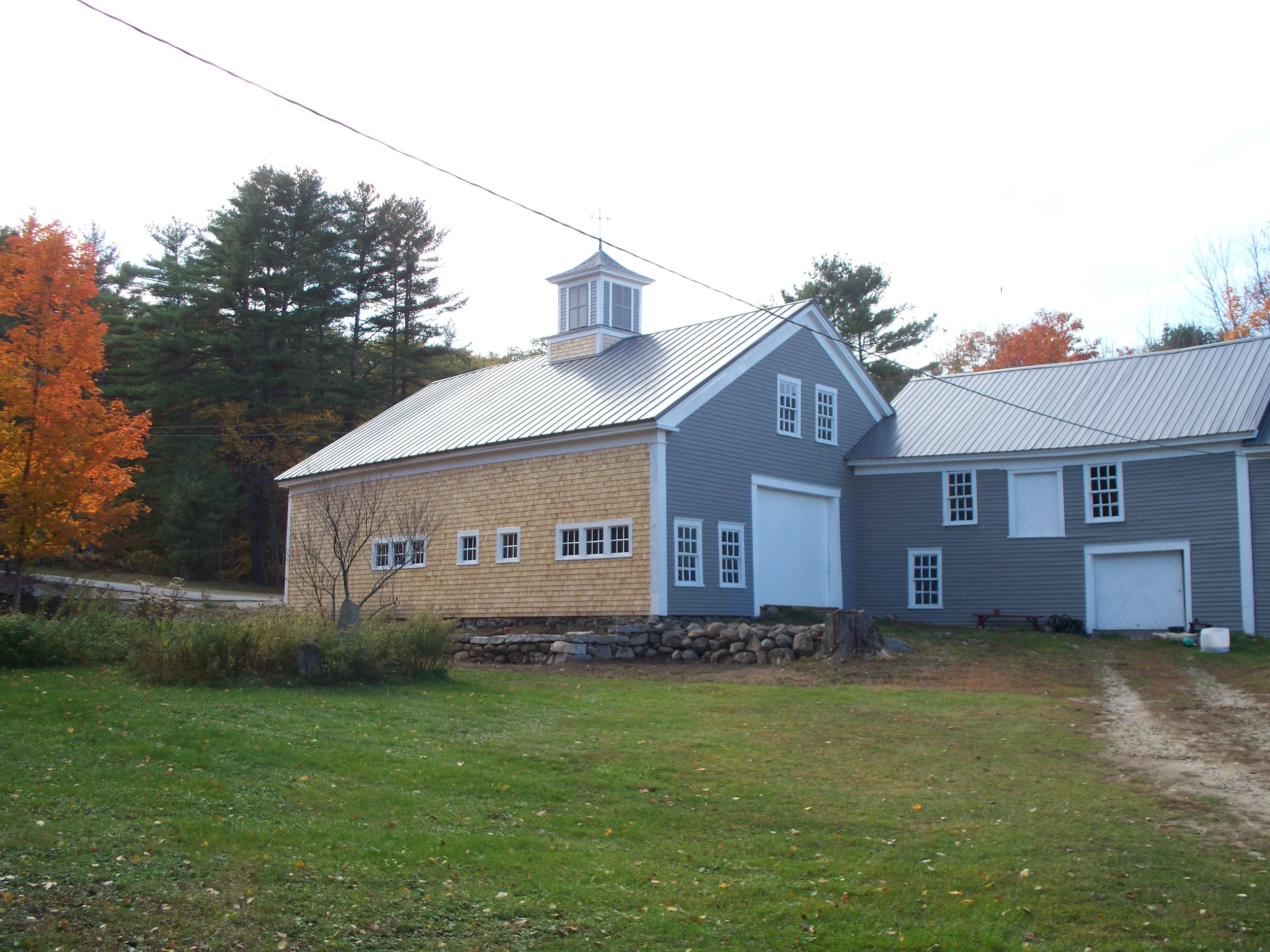 A completed project. New sills, joists, walls, siding, roof, floor, and cupola. Ready for the next 100 years.