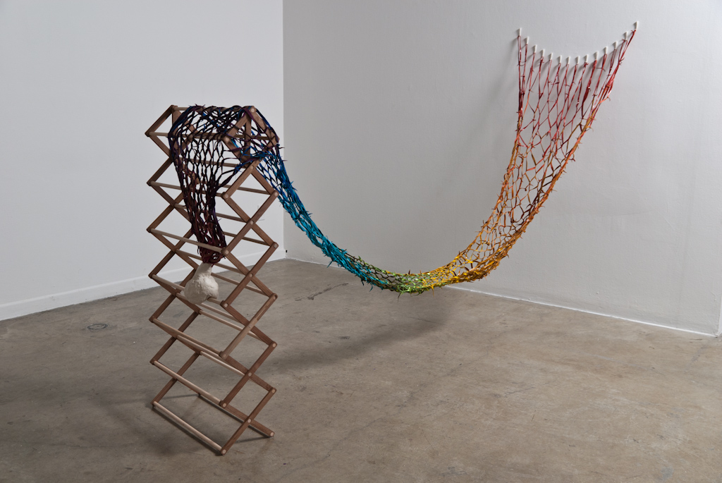 stanchions for E.H. (Thingdu) , 2012, spranged leather, porcelain vessel, walnut, maple, porcelain hooks