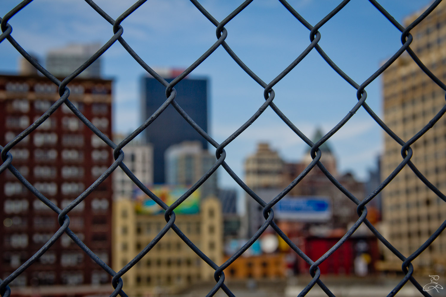 A caged view from the highline. Manhattan, NY.