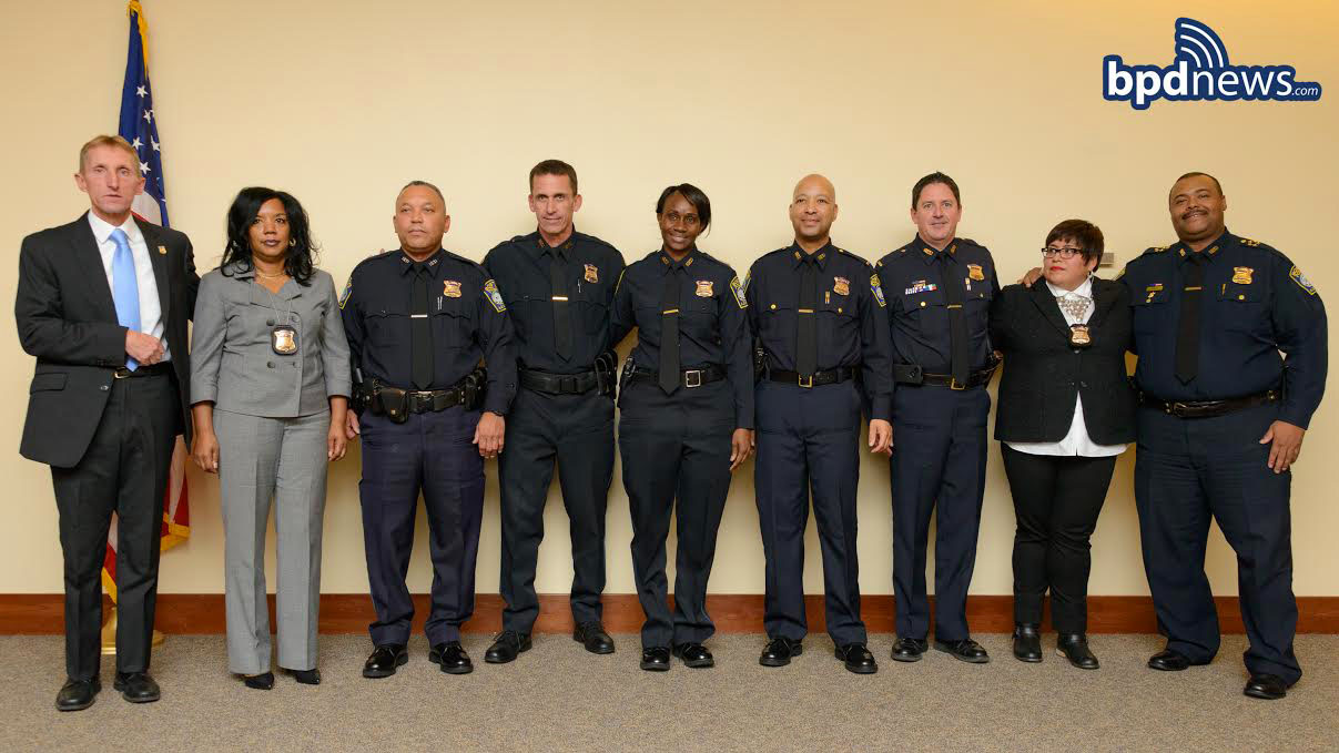 Pictured left to right: Commissioner Evans, Det. Cothenia Cooper, Sgt. John Teixeira, Sgt. Garrett Mitchell, Sgt. Sharon Dottin, Lt. Marwan Moss, Lt. Michael McCarthy, Det. Lucia Palomares, Chief William Gross
