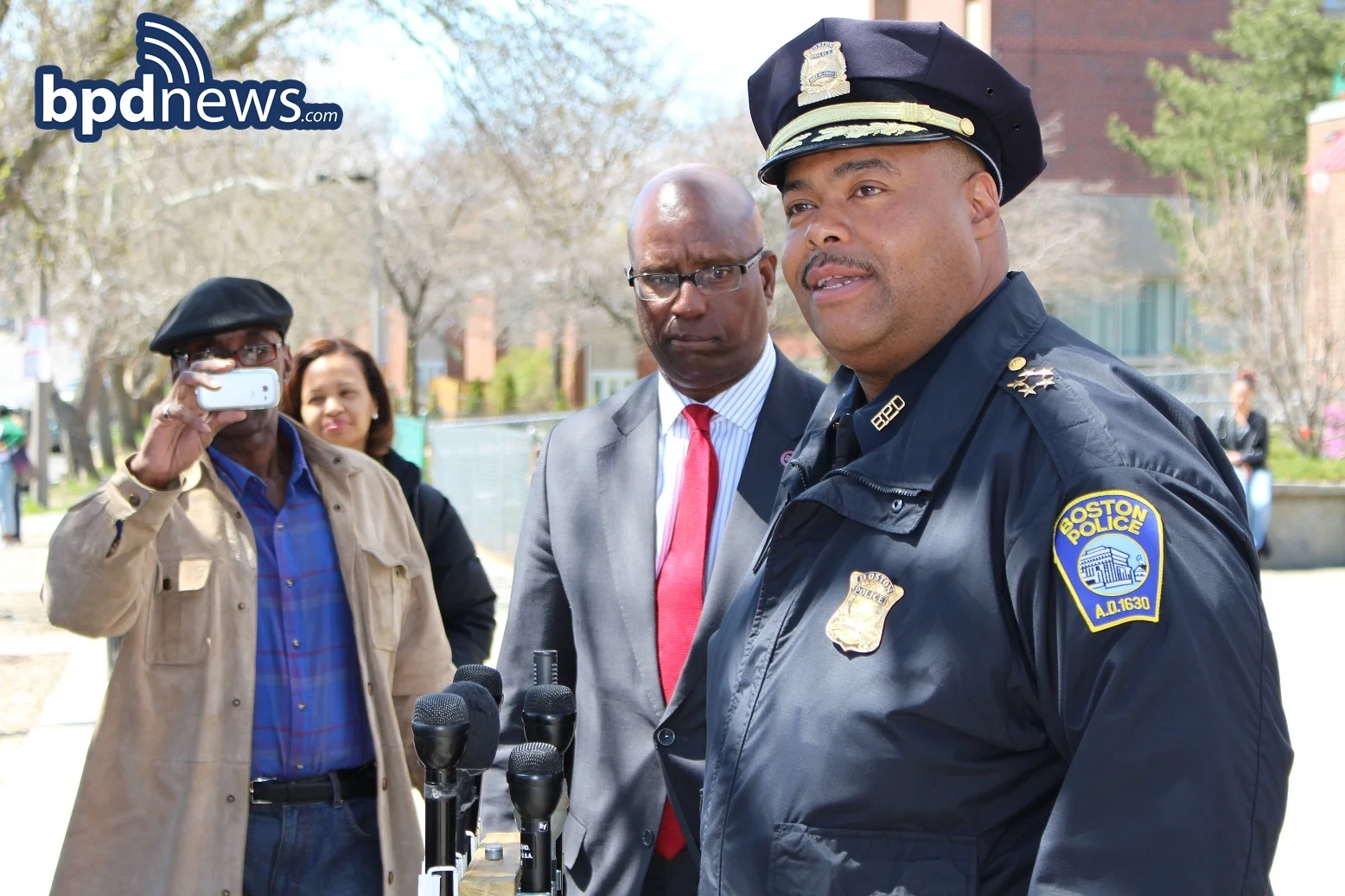 Chief William Gross addresses media outside NAACP Boston headquarters in Roxbury.