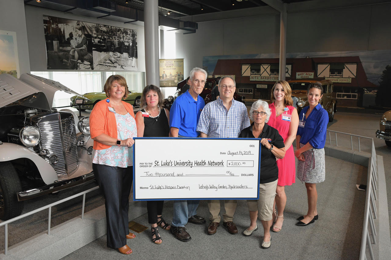 In front of an audience of classic cars, Lehigh Valley Garden Railroaders presented a generous gift of $2,000 to St. Luke's Hospice at the America on Wheels Museum. The gift was made in memory of the group's long-time treasurer, Barbara Karkutt, who was a faithful member and train enthusiast. St Luke’s sent a big thanks to the Railroaders for their thoughtful support and for enabling St. Luke's Hospice to care for all patients and families in need.