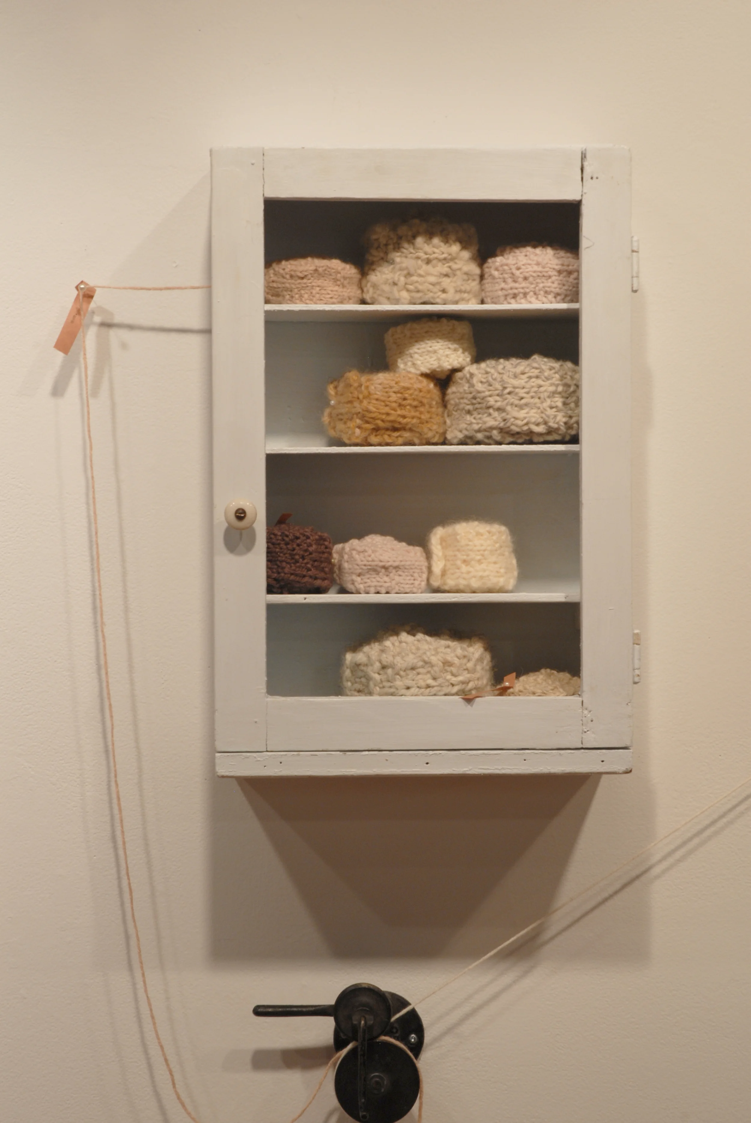   Oma  multi-media installation 2010  "The inspiration for this work was a bit of trivia about the French Revolution. &nbsp;In the summer before beginning my undergraduate thesis, I learned that knitting was used at this time to pass on messages, as 