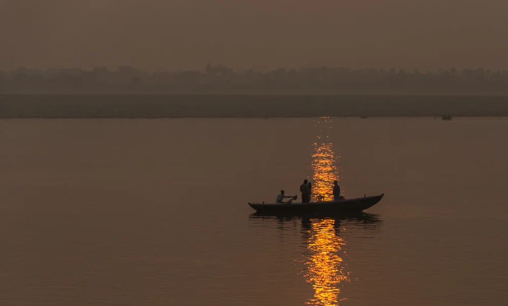 Drifting along the Ganges at dawn.