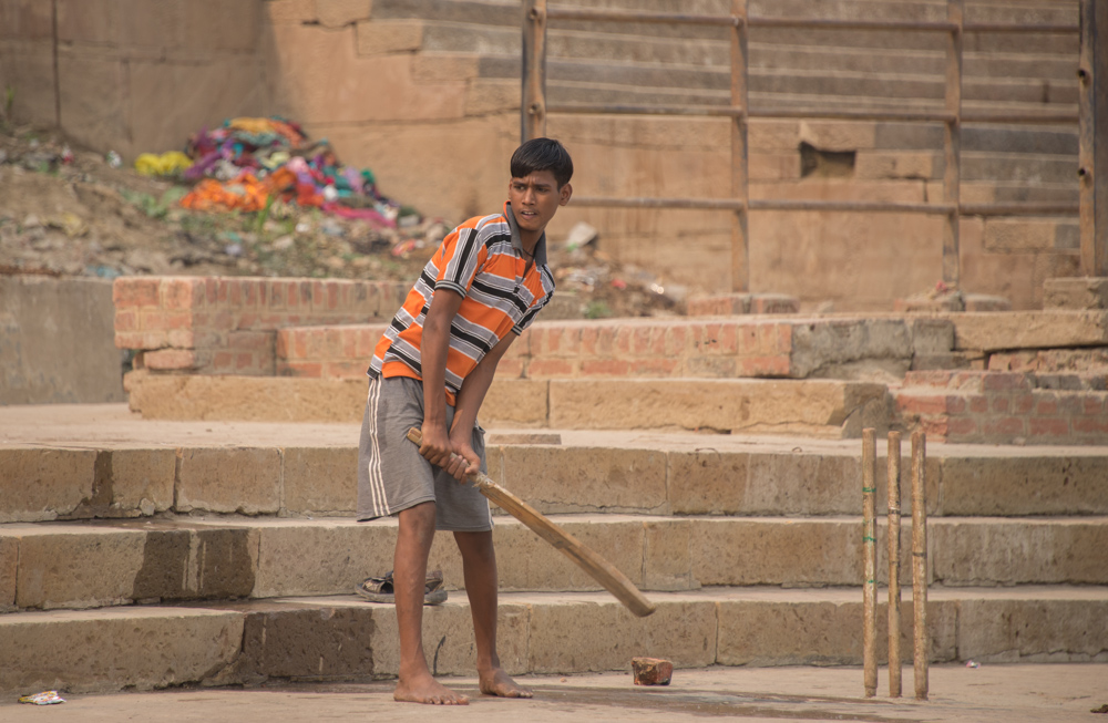 Indian boy playing cricket