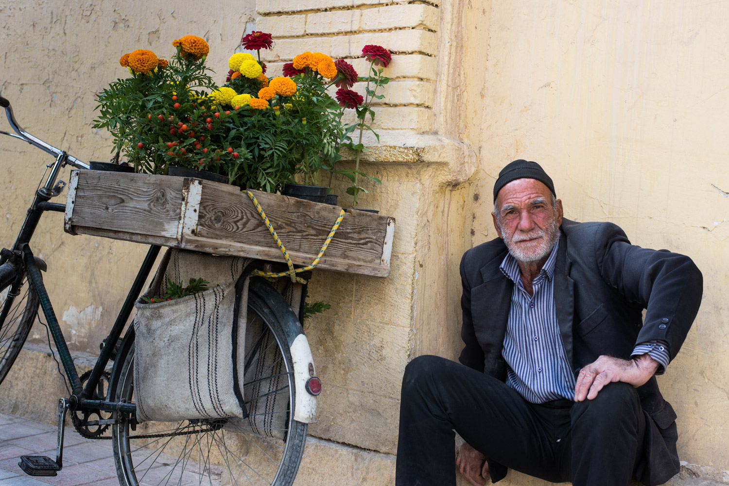A flower seller in the Armenian quarter of Esphahan, Iran. Older people have led a life witnessing continual change and upheaval. Many have a dignified stoicism that only comes with experience.
