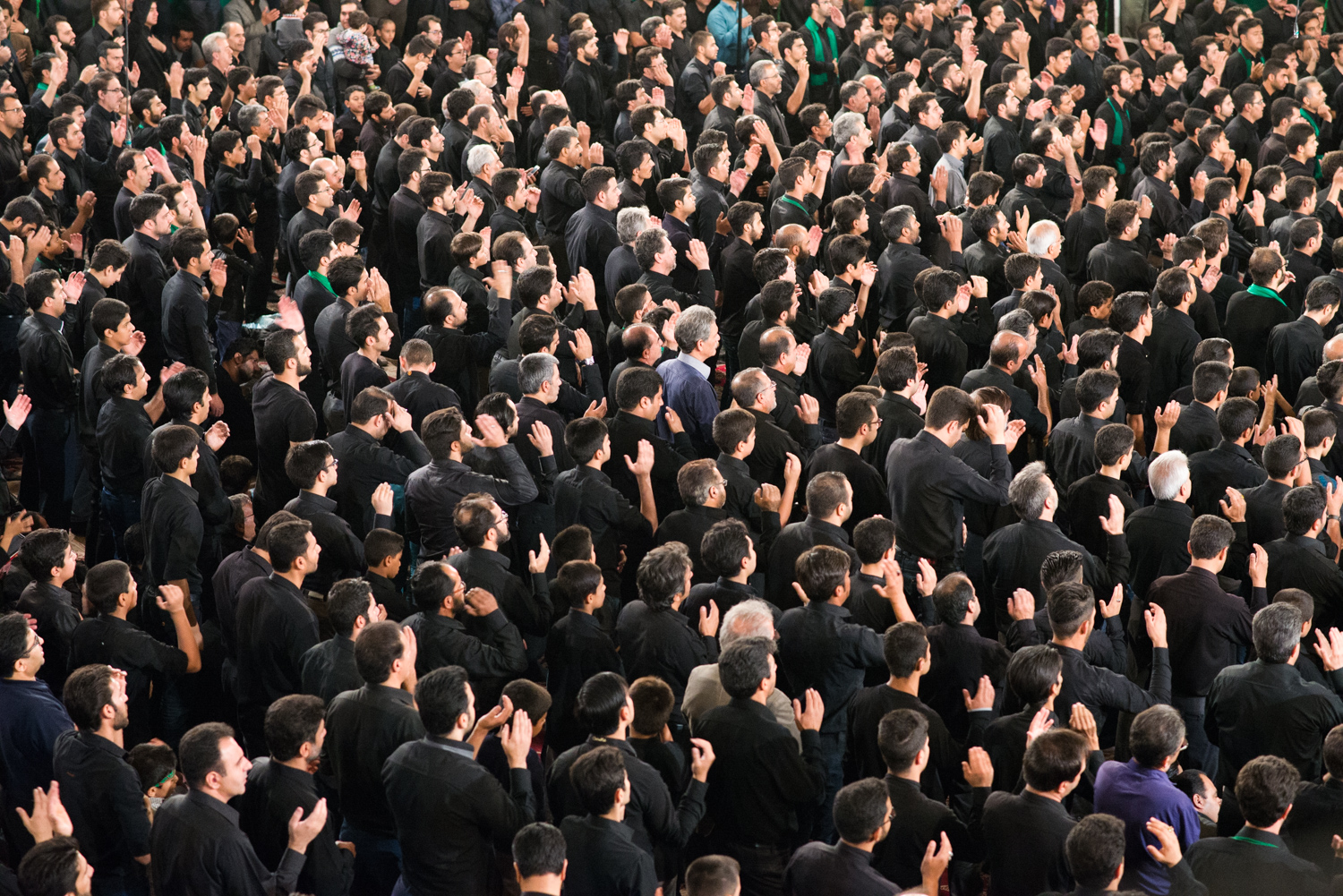 Men attending one of the many Ashura rituals at Esphahan, Iran. The orchestrated intensity of expressions of grief are devoutly followed.