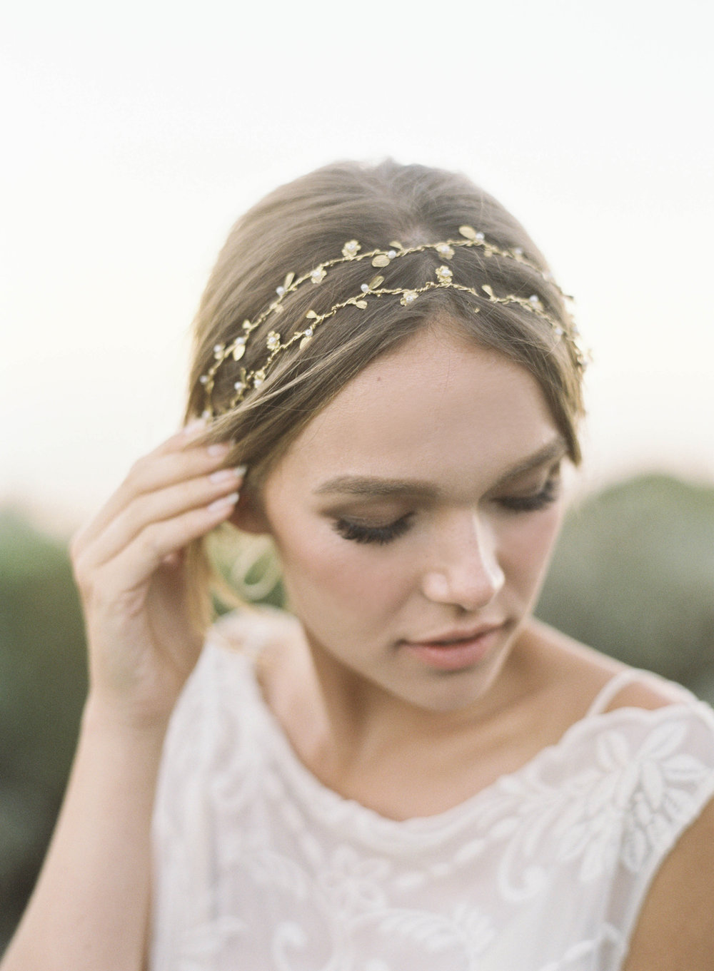 Forever everyone’s favorite hair vine,   Matilda   - subtly feminine and floral. Offered in gold, silver and rose gold with tiny pearl or crystal accents! Farm house wedding ready but also not too sweet for our city gals craving something floral!