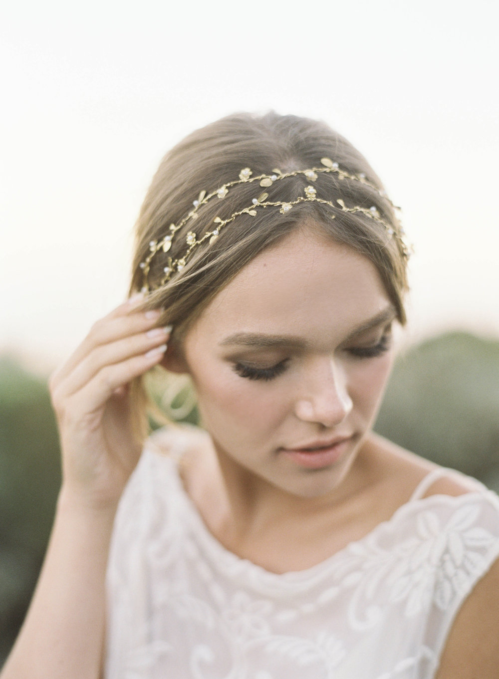 Forever everyone’s favorite hair vine, Matilda - subtly feminine and floral. Offered in gold, silver and rose gold with tiny pearl or crystal accents! Farm house wedding ready but also not too sweet for our city gals craving something floral!