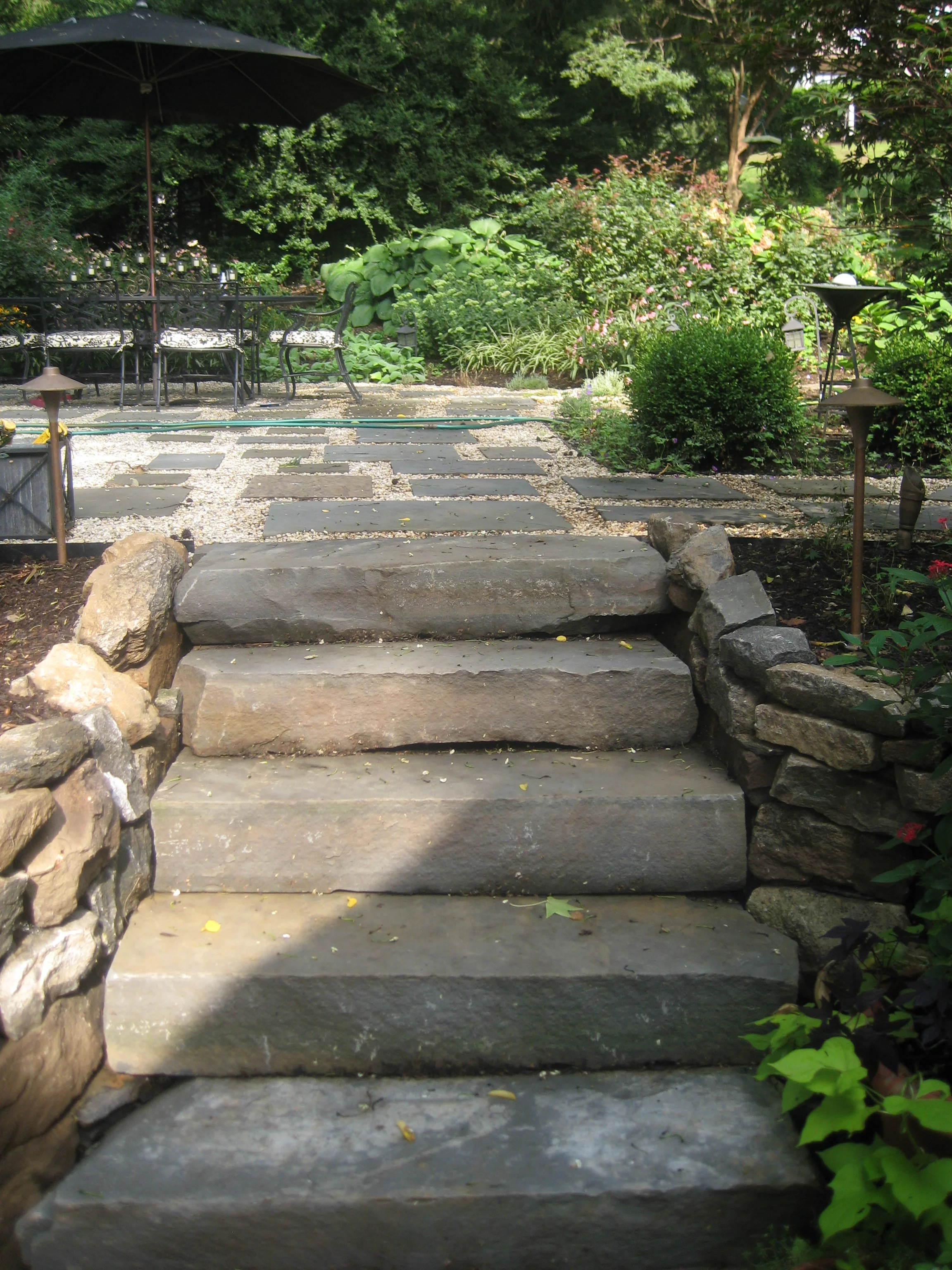  Large pieces of PA Bluestone were used together to create steps up to the raised terrace. 