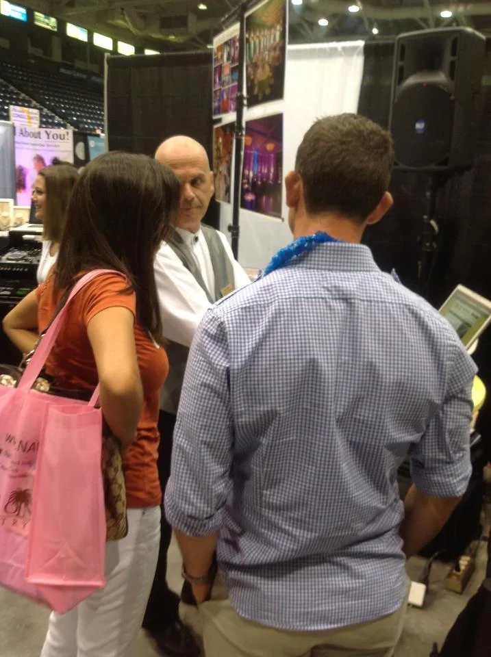 DJ Jim Dalia meets with Bride and Groom at the August 2012 Bridal Blast.