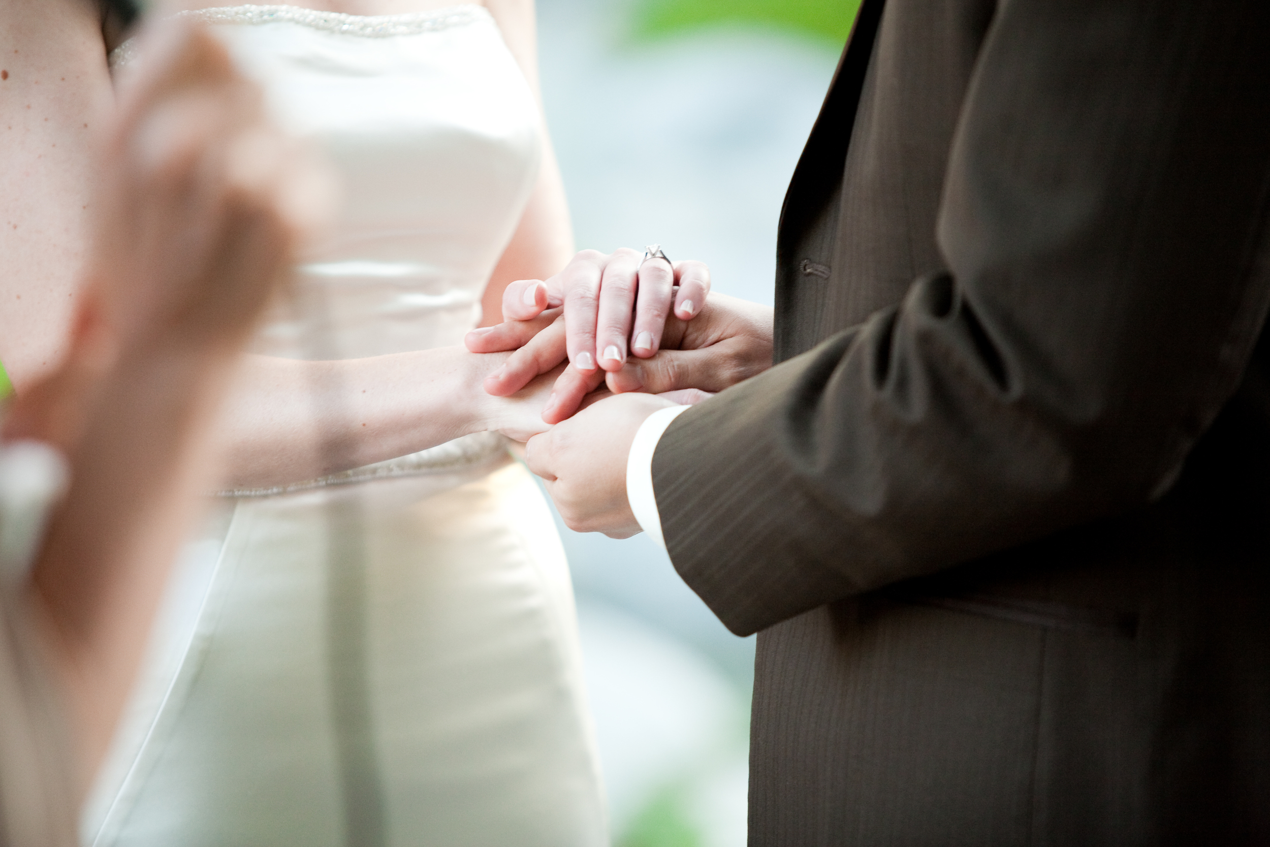 Pomeroy_1166 - Ceremony - Ringed hands.jpg