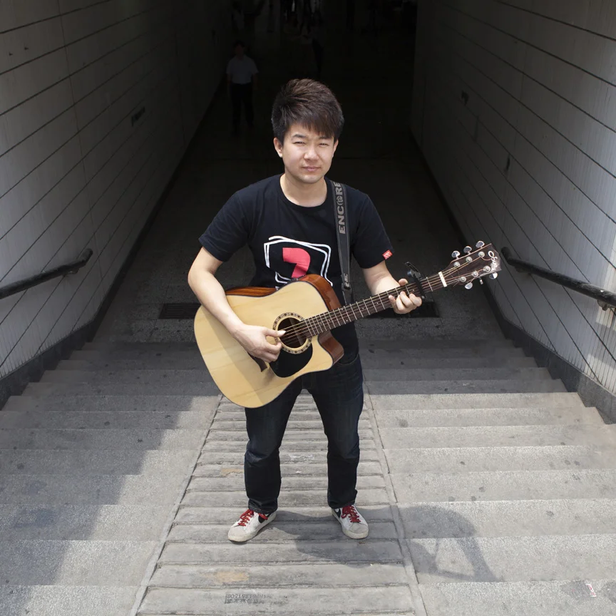  Street musician Ge Feng at the Chaoyangmen underpass where he often plays. Photographed for The World of Chinese in 2012. 