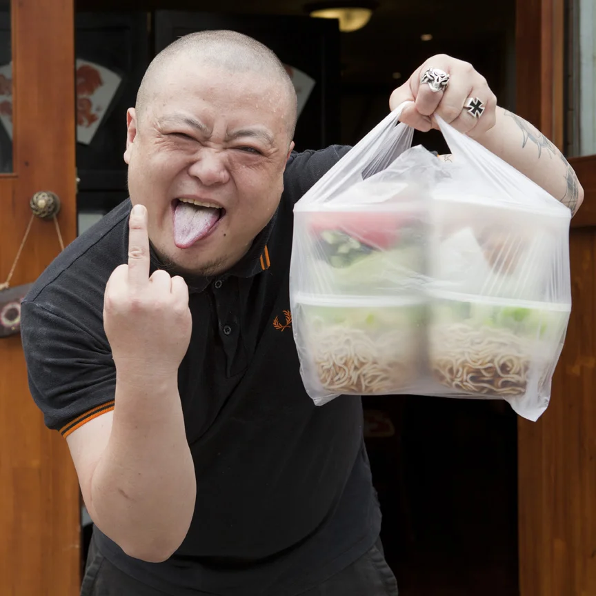 Lei Jun, lead singer of Beijing skinhead band Misandao and unlikely proprietor of local restaurant Noodle In. Photographed for The World of Chinese in June 2012. 