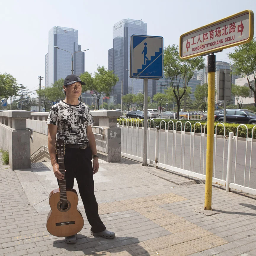  Underpass singer Wang Gengtian at Dongsishitiao, Beijing. Photographed for a feature on Beijing street musicians published in The World of Chinese magazine in 2012. 