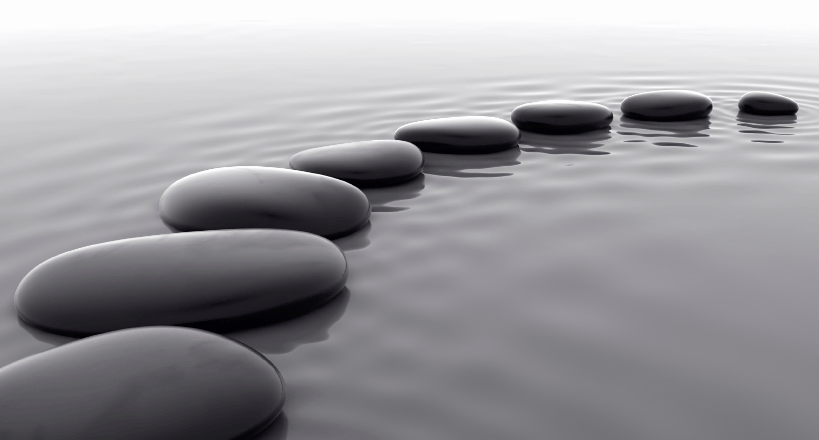 iStock_000007042239Medium---Pebbles-Aligned-on-Water---Lessons-Learned-1.gif