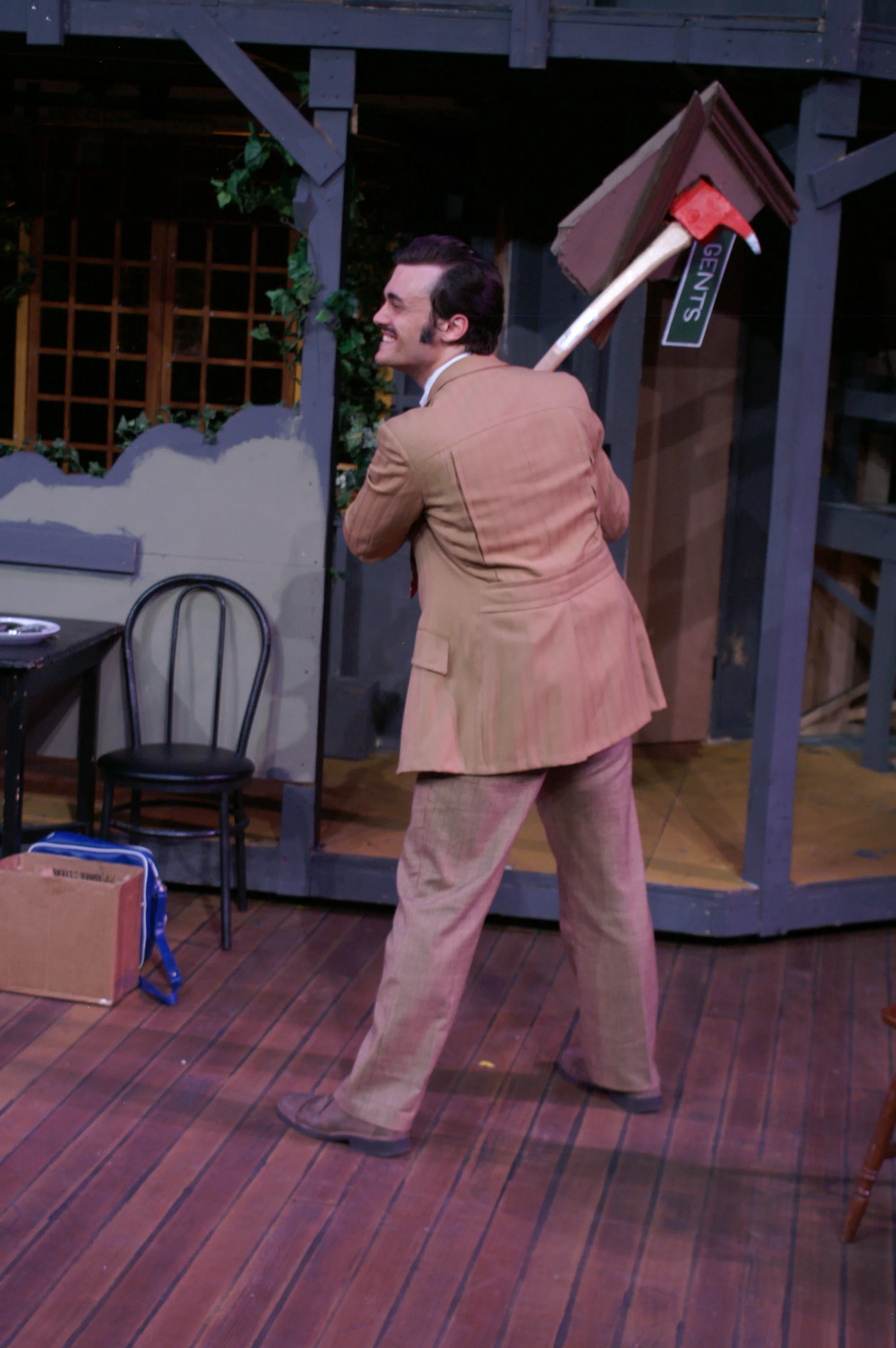 Axe with foam head and partial restroom door for " Noises Off" executed by student Tom Beckner