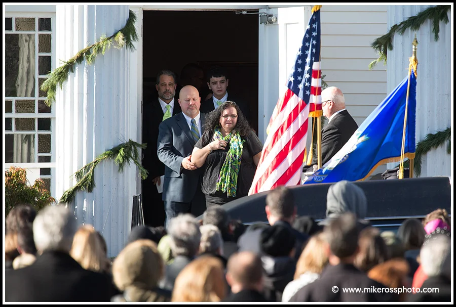 Mike Ross Connecticut freelance -A grief stricken Donna Soto mother of Victoria Soto, the first-grade teacher at Sandy Hook Elementary School who was shot and killed while protecting her students, wathces as they place her daugthers body into the hearse during funeral services at Lordship Community Church on December 15, 2012 in Stratford, Connecticut.