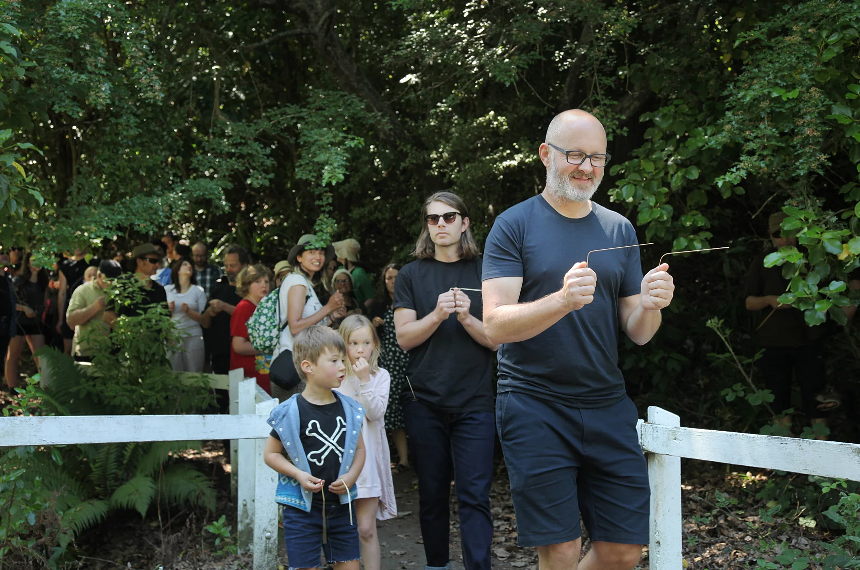 Josh Thomas (an Urban Dream Brokerage Advisory Board member) heads the water diviners at the opening of Awa HQ . Image: Justin Spiers.