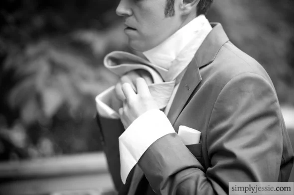 Groom getting ready at Blue Dress Barn
