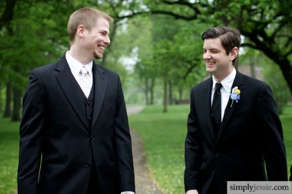 Best man & groom laughing
