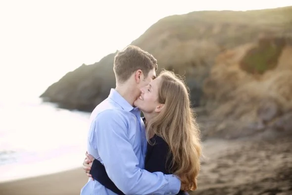 Hugging couple at Rodeo beach