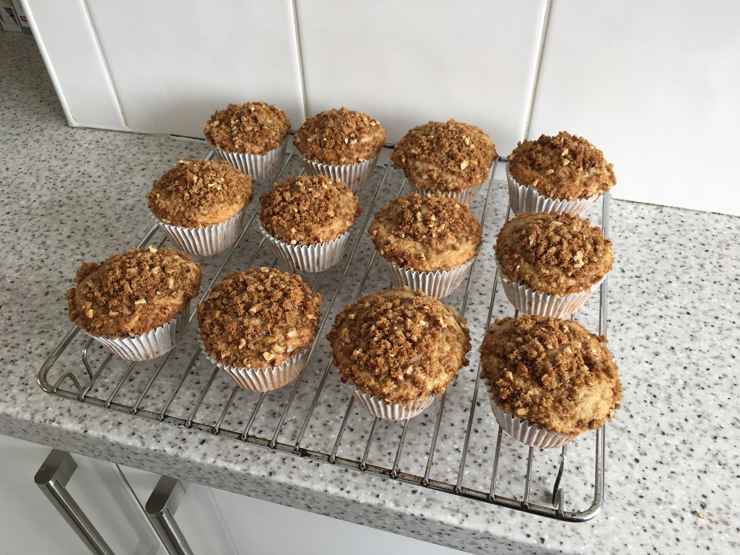 Roasted banana muffins with a pecan crumble topping