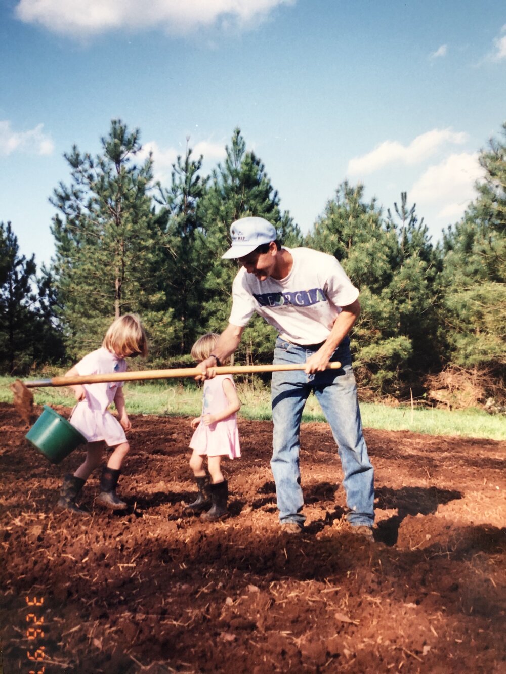 Garden helpers (my sister Elizabeth and me) and Dad. March 1997.