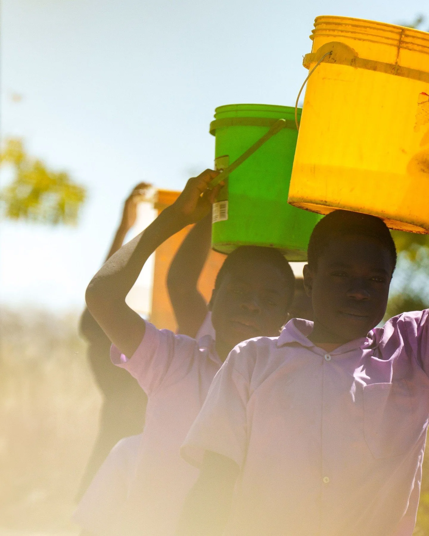 traditional ways of carrying water - before AND after the well. But at least after the clean well is ready, it will be a shorter walk AND won't  potentially cause illness #cleanwater #africa #chibombo @living_water @africa @liquidchurch
