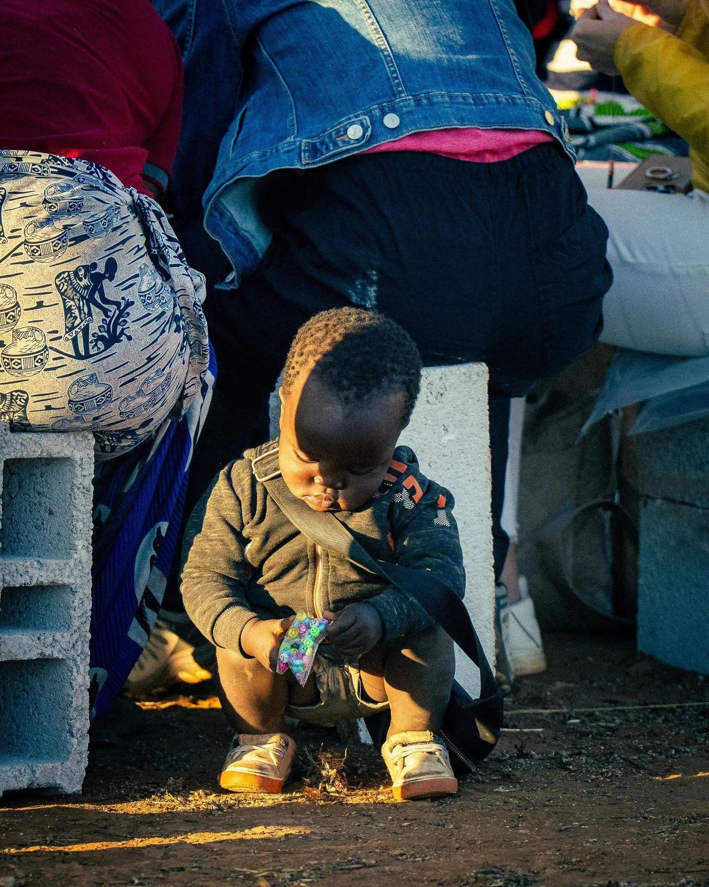 Another street portrait in @Africa - Our &quot;home base&quot; for most of the trip was outside of the capital city of Lusaka. This was a construction site for a church that is being built - and currently the &quot;pews&quot; are rows of cinder block