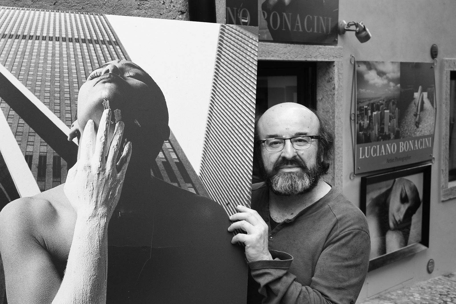 Luciano Bonacini in front of his gallery in Malcesine, Italy