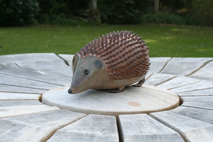 Hedgehog Here! - sculptural seat with bronze hedgehog.