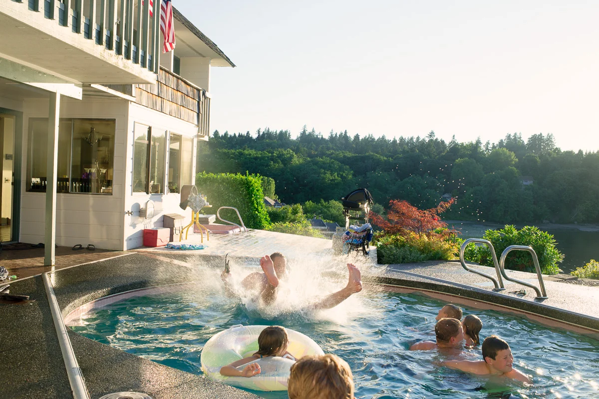 Jesse doing "The Butt" into the pool.