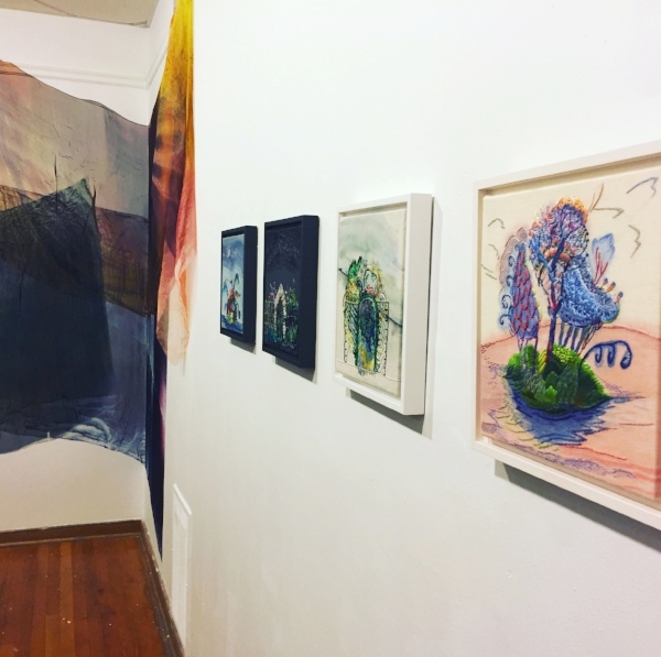 Thread Paintings next to installation by Matt Jacobs at UCAL