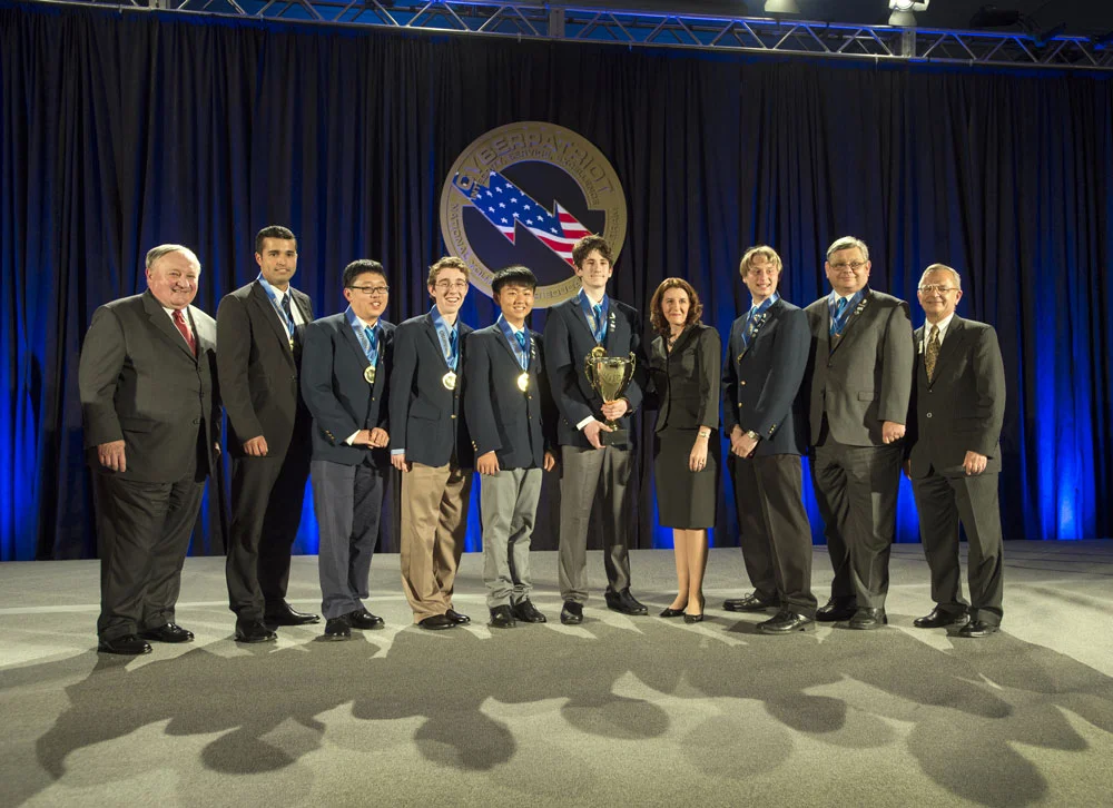 Members from North Hollywood High's Team Azure pose moments after winning the Open Division national championship at the CyberPatriot VI competition in National Harbor, Md.