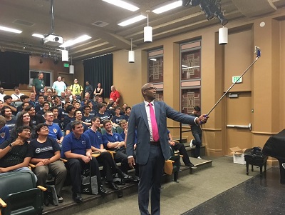Louis Stewart of GO-Biz uses a selfie stick at the inaugural California Cyber Innovation Challenge at Sacramento City College on Wednesday.
