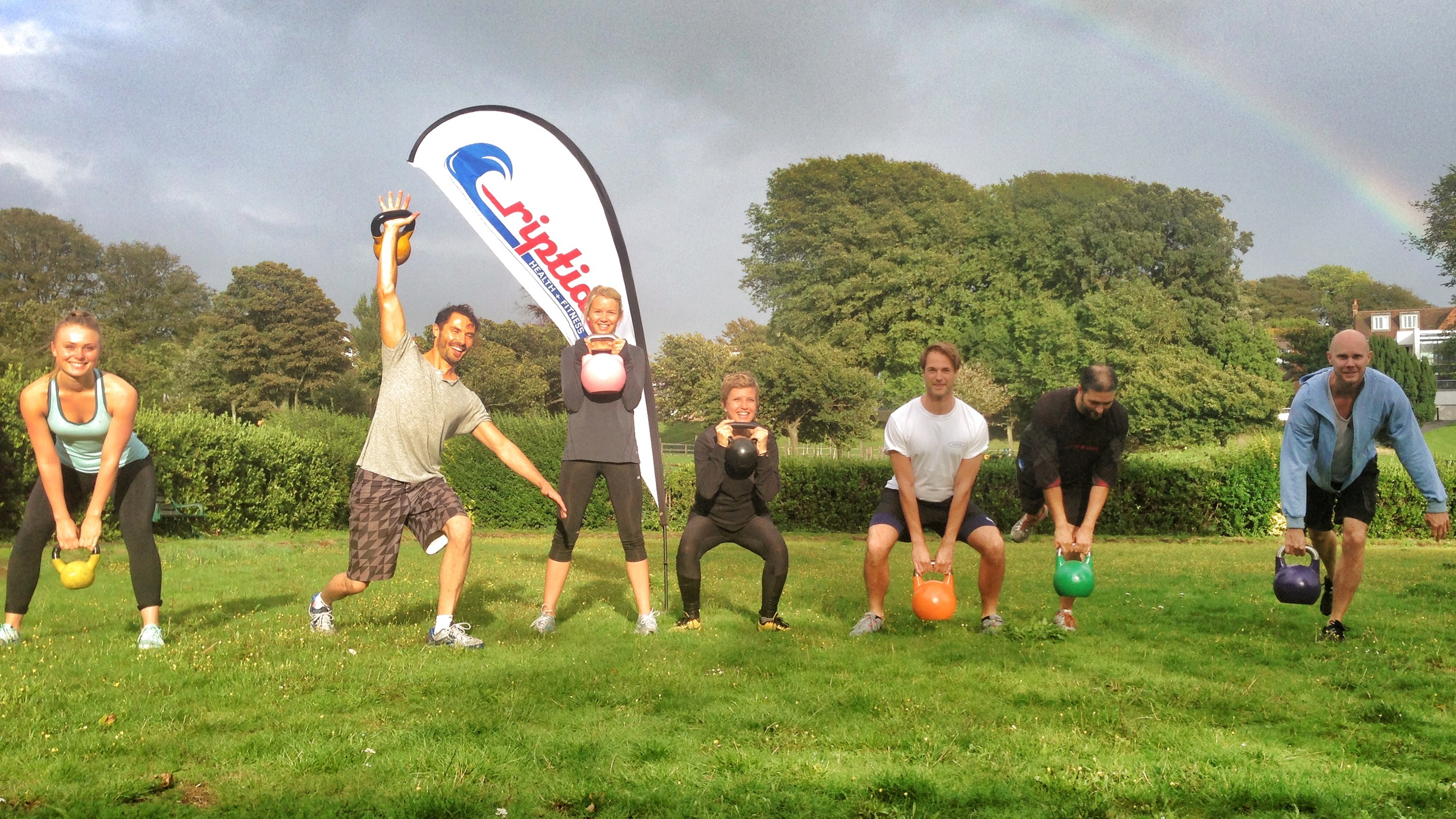 playing poses under a rainbow.jpg