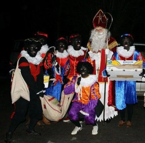 More on Sinterklaas and the zwarte pieten http://en.wikipedia.org/wiki/Sinterklaas (Image: www.aanbod.be )