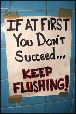 Sign displays: "If at first you don't succeed...keep flushing!"