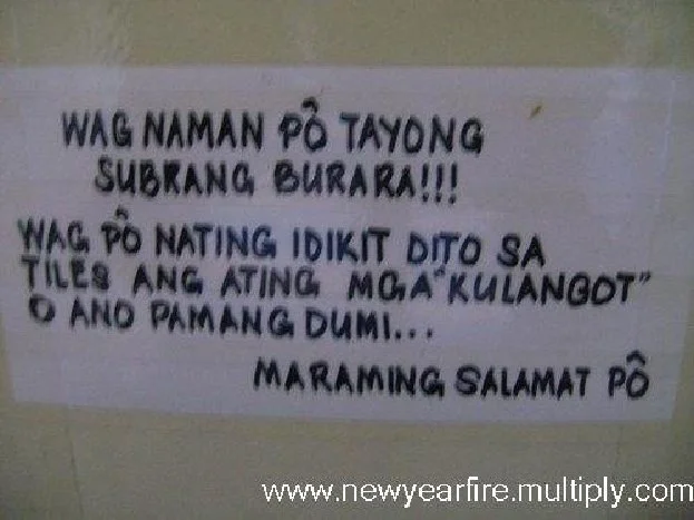 Sign displays: "Wag naman po tayong subrang burara!!! Wag po nating idikit dito sa tiles ang ating mga "kulangot" o ano pamang dumi...Maraming salamat po"